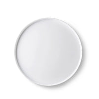 Side view of Alta Cucina 10.5" x 0.75" Opal Glass Medium Stacking Plate (Set of 12)