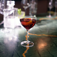 Side view of Bartender 8 oz. Novecento Martini Cocktail Glasses (Set of 4)