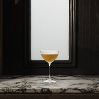 Side view of Bartender 8 oz. Novecento Martini Cocktail Glasses (Set of 4)