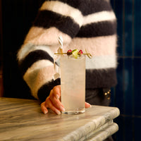 Side view of Exclusiva 16 oz. Tom Collins Cocktail Glasses (Set of 12)