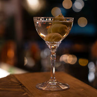 Side view of Florian 8.10 oz. Champagne / Martini Cocktail Glasses (Set of 4)