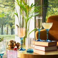 Side view of Florian 8.10 oz. Champagne / Martini Cocktail Glasses, Lucent Blue (Set of 4)