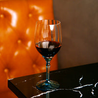 Side view of Florian 18 oz. Red Wine / Gin & Tonic Glasses, Lucent Blue (Set of 4)