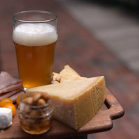 Side view of Nonix 19.75 oz. Stackable Pub Beer Glasses (Set of 12)