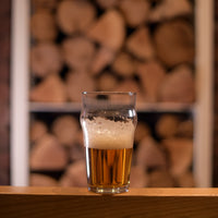 Side view of Nonix 19.75 oz. Stackable Pub Beer Glasses (Set of 12)