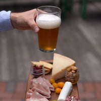 Side view of Nonix 19.75 oz. Stackable Pub Beer Glasses (Set of 12)