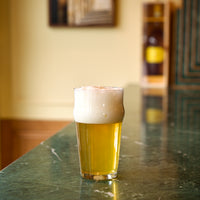 Side view of Nonix 19.75 oz. Stackable Pub Beer Glasses (Set of 12)