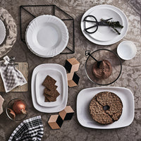 Side view of Parma 13.25" x 9.5" Opal Glass Serving Plate (Set of 12)