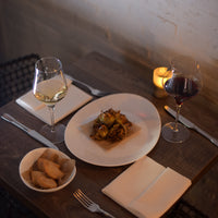 Side view of Prometeo 12.5" x 10.25" Opal Glass Steak Plate (Set of 6)