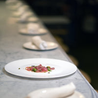 Side view of White Moon 10.63" Opal Glass Dinner Plate (Set of 24)