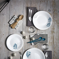 Side view of White Moon Botanica 9" Opal Glass Soup Plate, Blue (Set of 24)