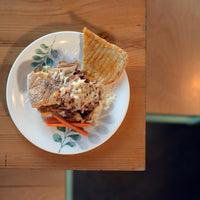 Side view of White Moon Botanica 9" Opal Glass Soup Plate, Green (Set of 24)